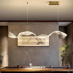 Erik – Dimmable Nordic LED Pendant Light with Creative Long Wave Design for Dining Tables and Bars Monalume.com
