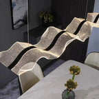 Erik – Dimmable Nordic LED Pendant Light with Creative Long Wave Design for Dining Tables and Bars Monalume.com